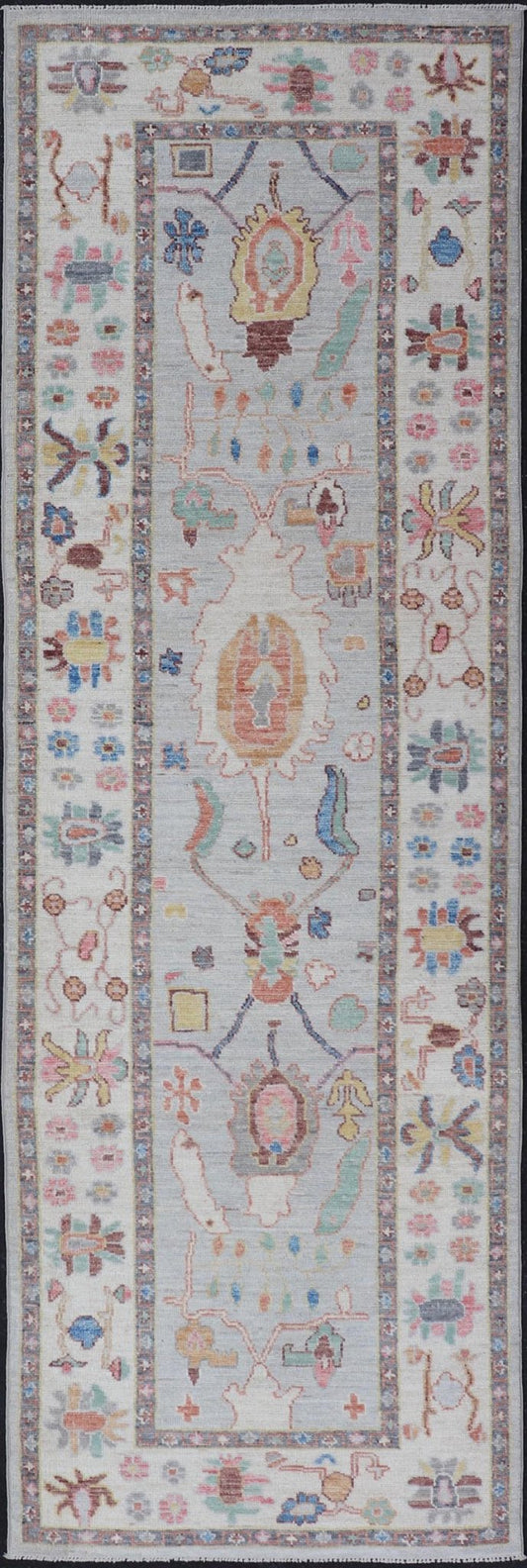 Measures: 3'1 x 10'0 Hand knotted in Afghanistan, this modern oushak runner showcasing the distinct large - scale angular floral design, with a modern bright splash of color against a cool gray background. The monotone cream - to - gray in the backgro... - Keivan Woven ArtsAWR - 6541 - 20085
