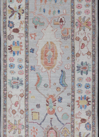 Measures: 3'1 x 10'0 Hand knotted in Afghanistan, this modern oushak runner showcasing the distinct large - scale angular floral design, with a modern bright splash of color against a cool gray background. The monotone cream - to - gray in the backgro... - Keivan Woven ArtsAWR - 6541 - 20085Rug