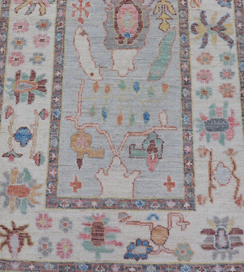 Measures: 3'1 x 10'0 Hand knotted in Afghanistan, this modern oushak runner showcasing the distinct large - scale angular floral design, with a modern bright splash of color against a cool gray background. The monotone cream - to - gray in the backgro... - Keivan Woven ArtsAWR - 6541 - 20085Rug