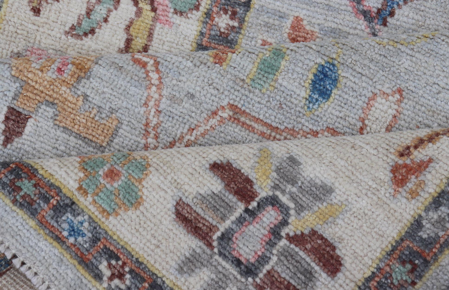 Measures: 3'1 x 10'0 Hand knotted in Afghanistan, this modern oushak runner showcasing the distinct large - scale angular floral design, with a modern bright splash of color against a cool gray background. The monotone cream - to - gray in the backgro... - Keivan Woven ArtsAWR - 6541 - 20085Rug
