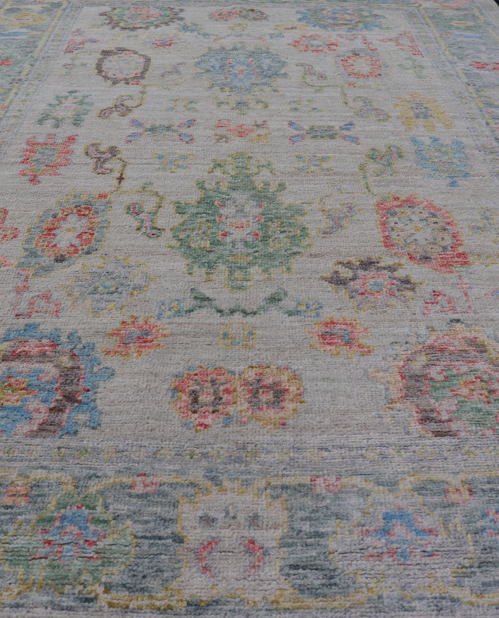 Modern All - Over Floral Oushak with Muted Background and Accent Colors. Measures: 4'2 x 6'2 Modern All - Over Floral Oushak with Muted Background and Accent Colors. Keivan Woven Arts: rug AWR - 6825 Country of Origin: Afghanistan Type: Oushak Design... - Keivan Woven ArtsAWR - 6825 - 23193Rug