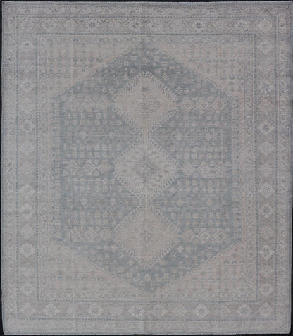 Modern Persian Shiraz Rug with Tribal Design in Light Blue Background and Taupe. Keivan Woven Arts/ rug AWR - 8003 Country of Origin: Afghanistan Type: Shiraz Design: Floral, Medallion Abstract - Tribal Measures: 8' x 9'9 This Shiraz present... - Keivan Woven ArtsAWR - 8003 - 21487Rug