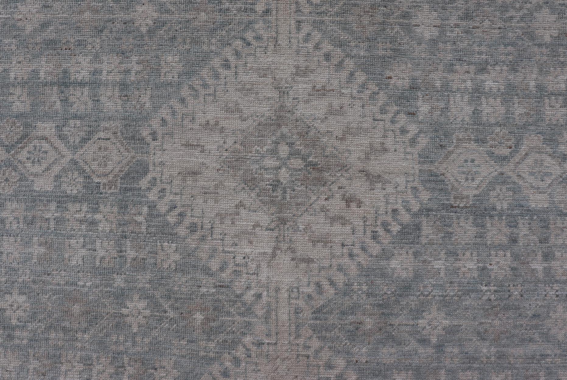 Modern Persian Shiraz Rug with Tribal Design in Light Blue Background and Taupe. Keivan Woven Arts/ rug AWR - 8003 Country of Origin: Afghanistan Type: Shiraz Design: Floral, Medallion Abstract - Tribal Measures: 8' x 9'9 This Shiraz present... - Keivan Woven ArtsAWR - 8003 - 21487Rug