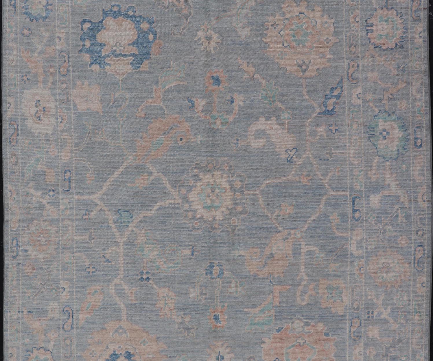 Modern Oushak Rug With in Light Gray Blue Background and All - Over Floral Motifs Modern Oushak Rug Keivan Woven Arts; rug AWR - 8052 Country of Origin: Afghanistan Type: Oushak Design: All - Over, Floral Measures: 5'11 x 9'1 Hand - Knotted in ... - Keivan Woven ArtsAWR - 8052 - 21251Rug