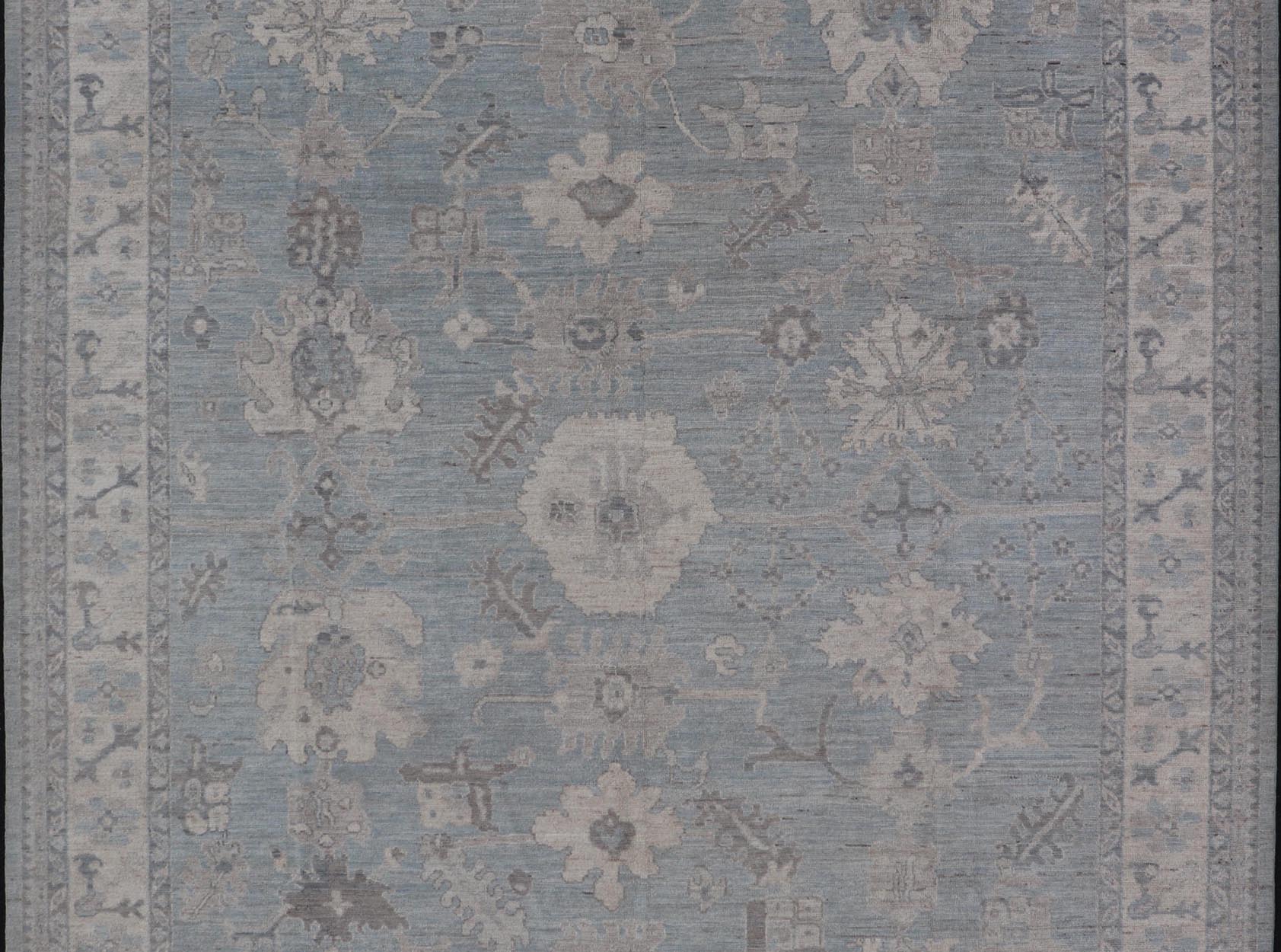Modern Oushak with Floral and Tribal Motifs with Cream, Gray and Powder Blue. Keivan Woven Arts; rug AWR - 8234 Country of Origin: Afghanistan Type: Oushak Design: Floral, All - Over Abstract - Tribal 21st Century Measures: 9'11 x 13'10 This moder... - Keivan Woven ArtsAWR - 8234 - 21227Rug