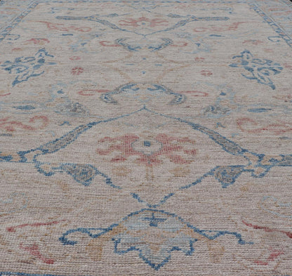 All - Over Hand Knotted Oushak Rug with Arabesque Design in Ivory and Blue Tones Hand knotted Oushak made in wool with a field is backed by a ivory color, with a light blue border, etched with elegant golden/brown branches. The arabesque - like des... - Keivan Woven ArtsAWR - 8252 - 21403Rug