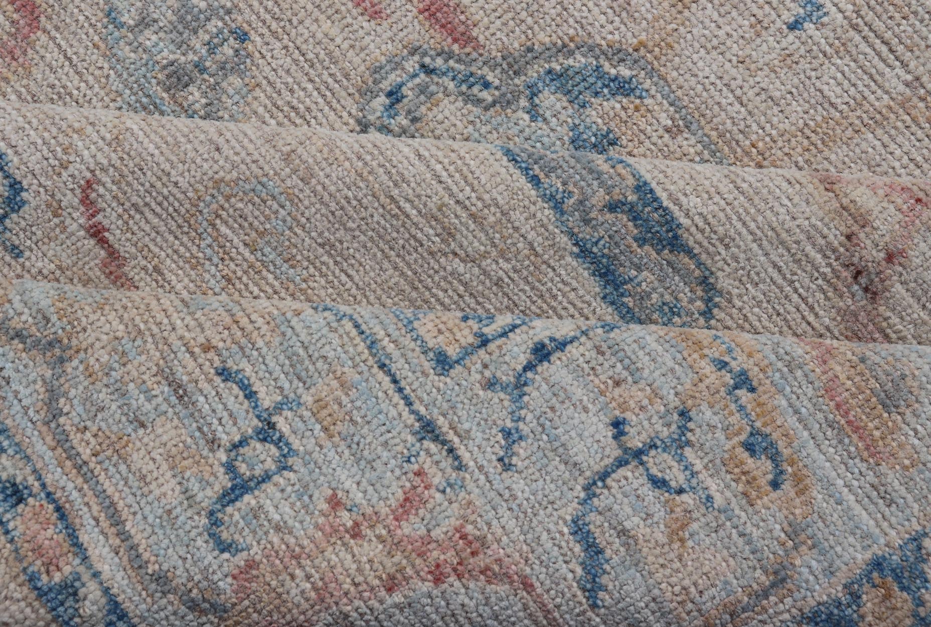 All - Over Hand Knotted Oushak Rug with Arabesque Design in Ivory and Blue Tones Hand knotted Oushak made in wool with a field is backed by a ivory color, with a light blue border, etched with elegant golden/brown branches. The arabesque - like des... - Keivan Woven ArtsAWR - 8252 - 21403Rug