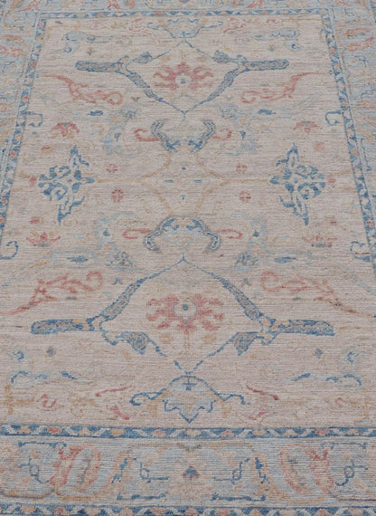 All - Over Hand Knotted Oushak Rug with Arabesque Design in Ivory and Blue Tones Hand knotted Oushak made in wool with a field is backed by a ivory color, with a light blue border, etched with elegant golden/brown branches. The arabesque - like des... - Keivan Woven ArtsAWR - 8252 - 21403Rug