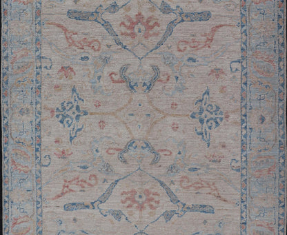 All - Over Hand Knotted Oushak Rug with Arabesque Design in Ivory and Blue Tones Hand knotted Oushak made in wool with a field is backed by a ivory color, with a light blue border, etched with elegant golden/brown branches. The arabesque - like des... - Keivan Woven ArtsAWR - 8252 - 21403Rug