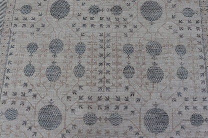 Modern Tribal Khotan Rug In Shades of Cream, Tan, and Light Teal This modern Khotan features a modern muted array of teal, cream, taupe. The background is a beautifully blended cream, topped by an intricate pomegranate design in teal . ... - Keivan Woven ArtsAWR - 8384 - 20836Rug