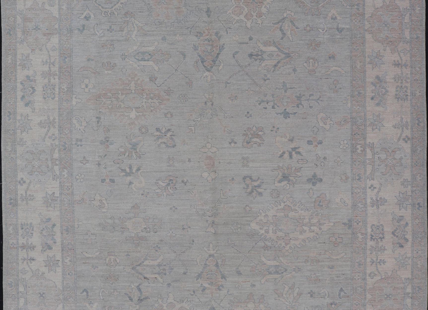 Modern All - Over Floral Oushak with Light Gray Background And Neutral Colors Keivan Woven Arts rug AWR - 8468 Country of Origin: Afghanistan Type: Oushak Design: Floral, All - Over, Abstract Floral. Measures: 9'0 x 11'9 This Oushak was hand - knott... - Keivan Woven ArtsAWR - 8468 - 21257Rug