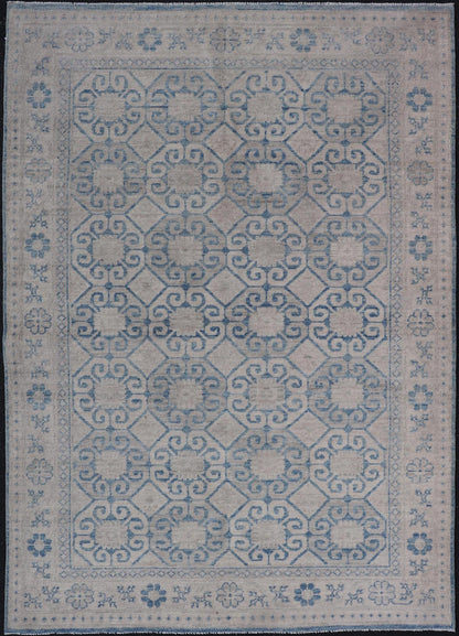 Modern All - Over Tribal Motif Khotan Area Rug in Muted Blues and Cream. Country of Origin: Afghanistan; Type: Khotan; Design: Floral, All - Over; Keivan Woven Arts: rug/AWR - 8474 Measures: 4'10 x 7'3 This modern Khotan features a modern muted blue's... - Keivan Woven ArtsAWR - 8474 - 21355Rug