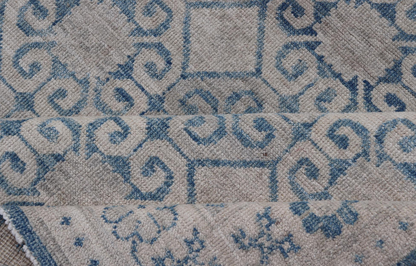 Modern All - Over Tribal Motif Khotan Area Rug in Muted Blues and Cream. Country of Origin: Afghanistan; Type: Khotan; Design: Floral, All - Over; Keivan Woven Arts: rug/AWR - 8474 Measures: 4'10 x 7'3 This modern Khotan features a modern muted blue's... - Keivan Woven ArtsAWR - 8474 - 21355Rug