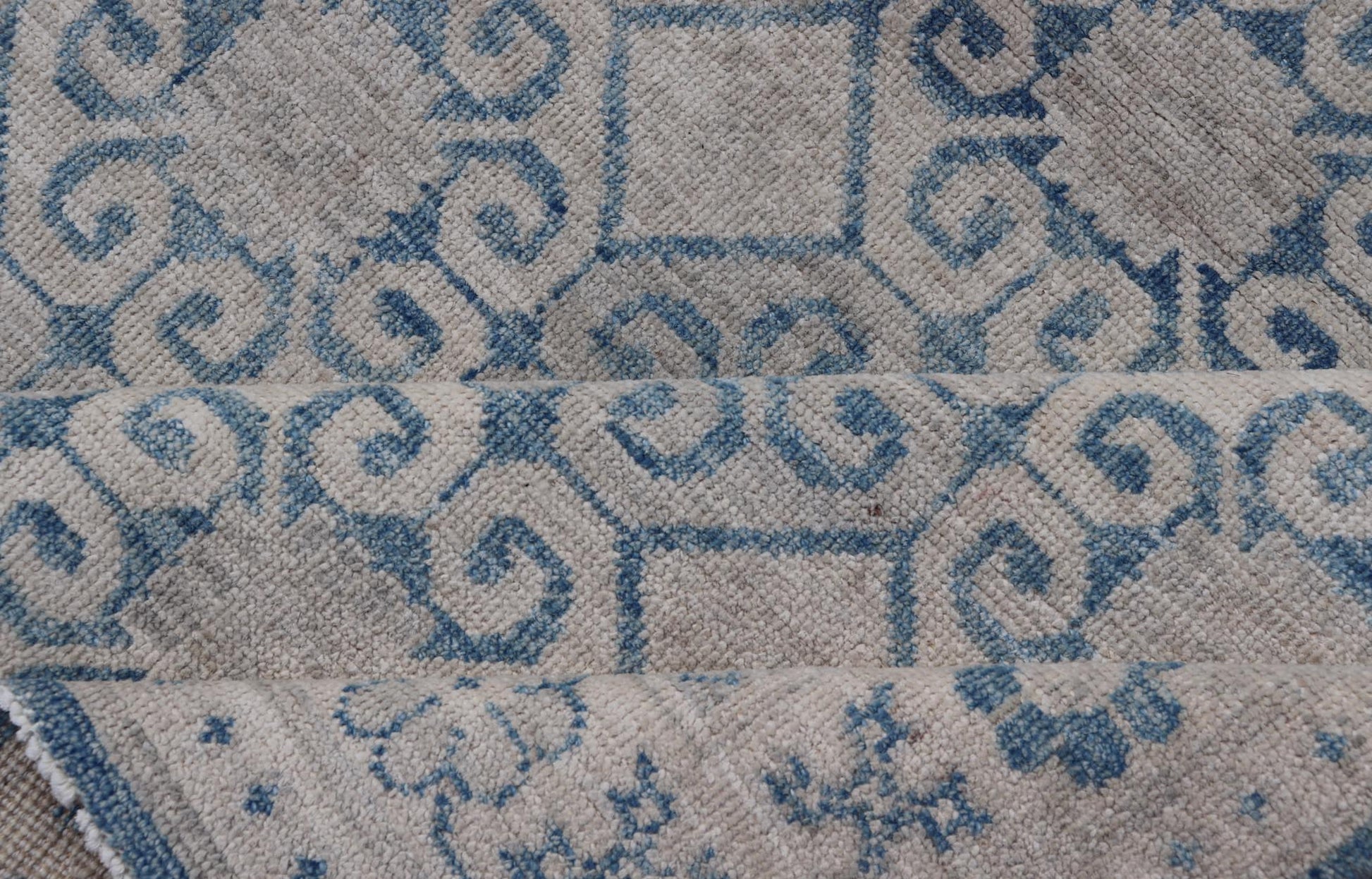 Modern All - Over Tribal Motif Khotan Area Rug in Muted Blues and Cream. Country of Origin: Afghanistan; Type: Khotan; Design: Floral, All - Over; Keivan Woven Arts: rug/AWR - 8474 Measures: 4'10 x 7'3 This modern Khotan features a modern muted blue's... - Keivan Woven ArtsAWR - 8474 - 21355Rug