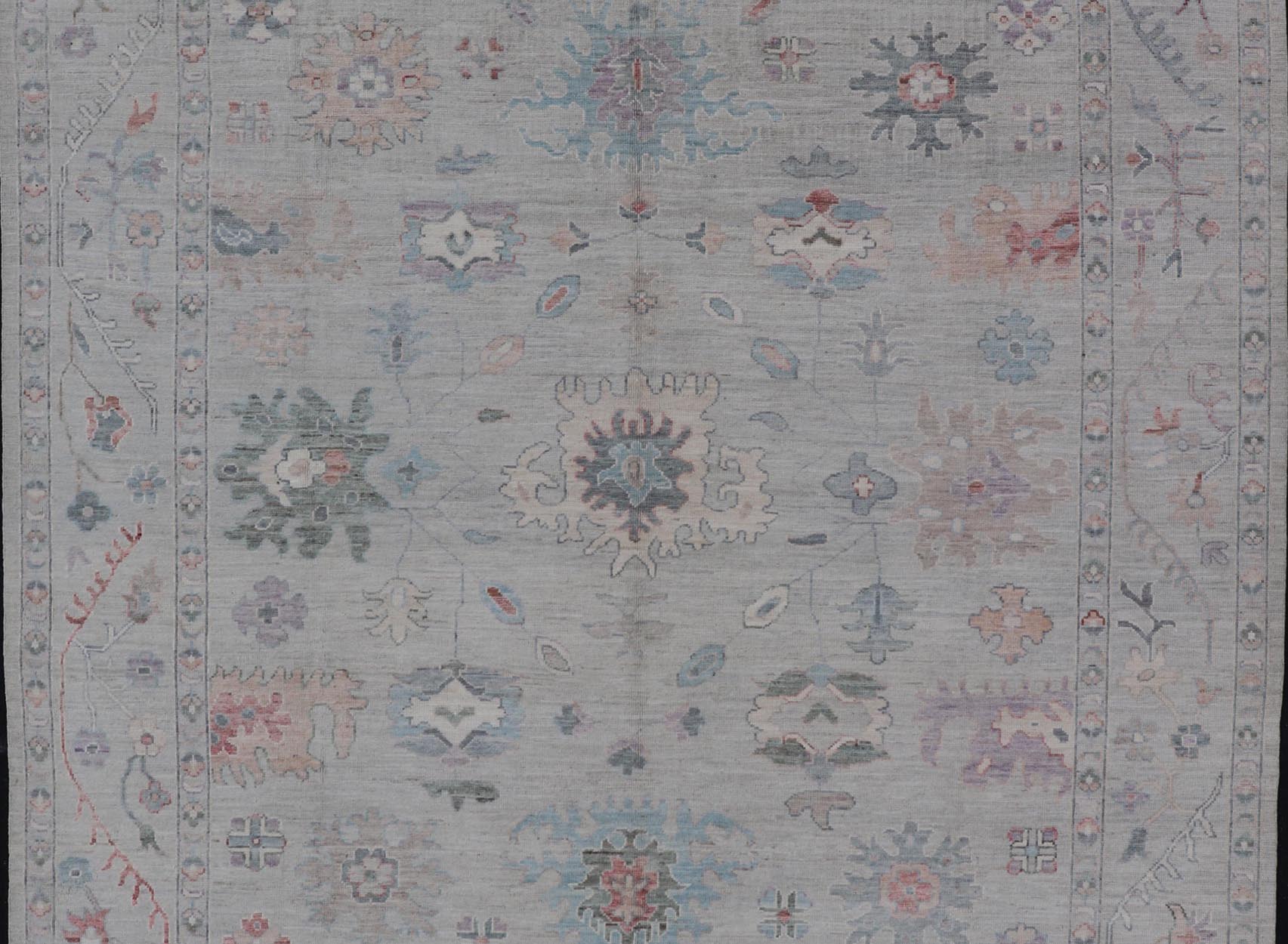 All Over Modern Floral Oushak with A Light Blue - Gray Field and Border With Color Keivan Woven Arts; rug AWR - 8546 Country of Origin: Afghanistan Type: Oushak Design: All - Over, Floral, Arabesque - Floral 21st Century Measures: 9'11 x 14'0 ... - Keivan Woven ArtsAWR - 8546 - 21293Rug