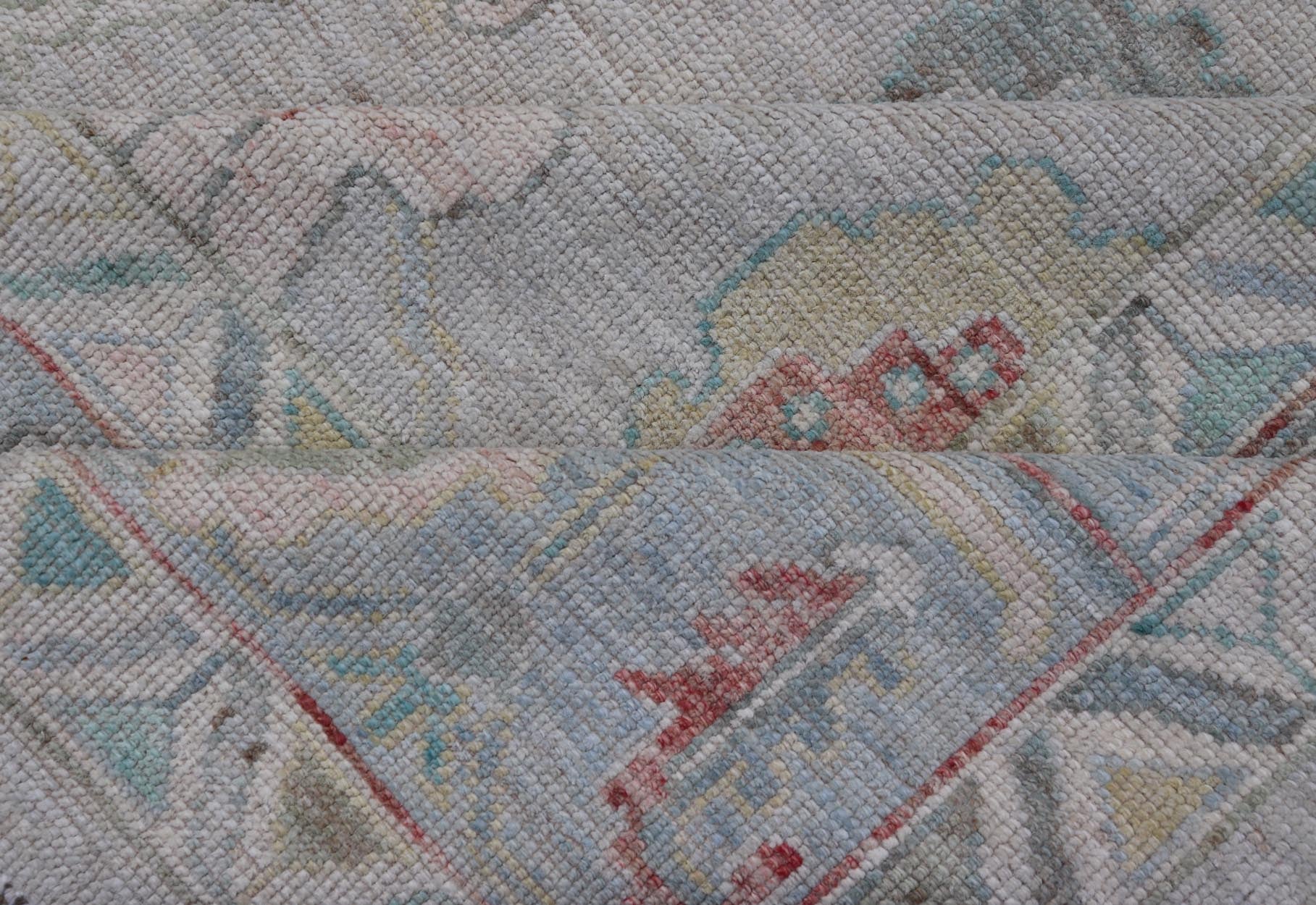 Large Modern Oushak with floral design on light blue/gray border with pops of color. Keivan Woven Arts; rug AWR - 9004 Country of Origin: Afghanistan Type: Oushak Design: Mosaic Floral, All - Over. 21st century. Measures: 10'1 x 13'10. The fi... - Keivan Woven ArtsAWR - 9004 - 21311Rug
