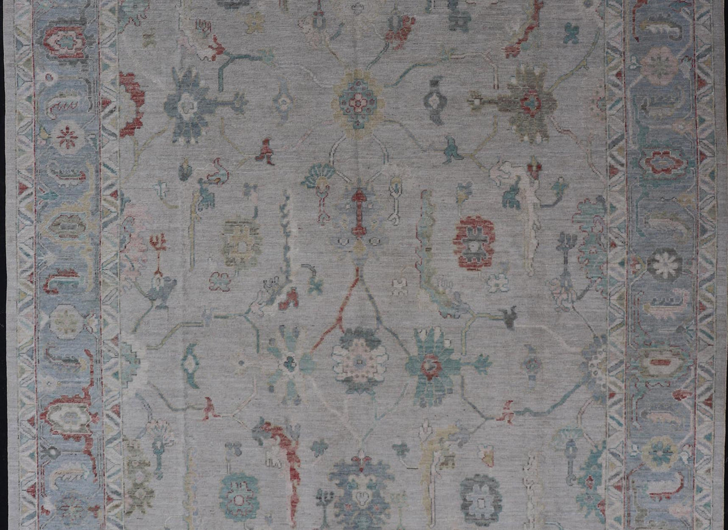 Large Modern Oushak with floral design on light blue/gray border with pops of color. Keivan Woven Arts; rug AWR - 9004 Country of Origin: Afghanistan Type: Oushak Design: Mosaic Floral, All - Over. 21st century. Measures: 10'1 x 13'10. The fi... - Keivan Woven ArtsAWR - 9004 - 21311Rug