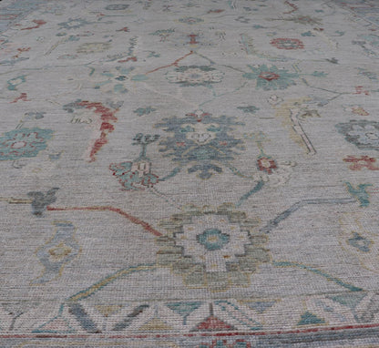 Large Modern Oushak with floral design on light blue/gray border with pops of color. Keivan Woven Arts; rug AWR - 9004 Country of Origin: Afghanistan Type: Oushak Design: Mosaic Floral, All - Over. 21st century. Measures: 10'1 x 13'10. The fi... - Keivan Woven ArtsAWR - 9004 - 21311Rug