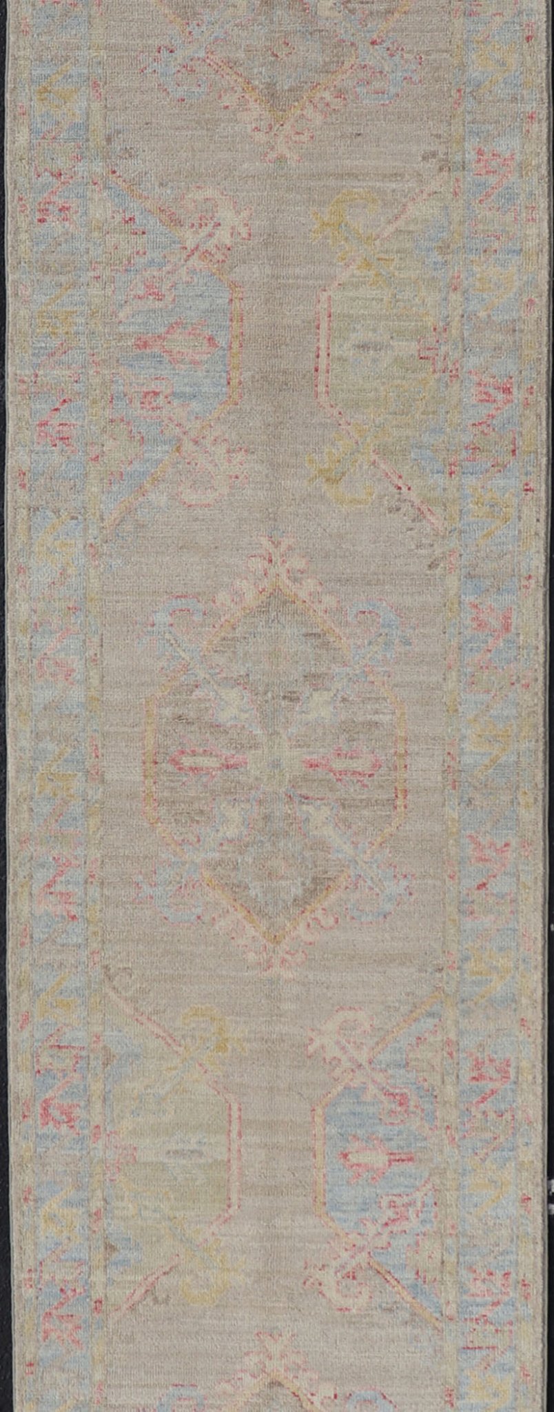 Hand - Knotted Oushak Runner With Medallion Design on a Tan Field With Red & Blue. Keivan Woven Arts; rug AWR - AR118 Country of Origin: Afghanistan Type: Oushak Design: Medallion, Motif, Floral Motif This modern piece holds large medallions in the ... - Keivan Woven ArtsAWR - AR118 - 17178Rug