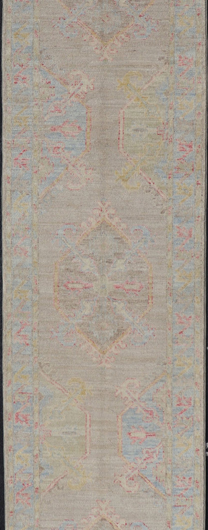 Hand - Knotted Oushak Runner With Medallion Design on a Tan Field With Red & Blue. Keivan Woven Arts; rug AWR - AR118 Country of Origin: Afghanistan Type: Oushak Design: Medallion, Motif, Floral Motif This modern piece holds large medallions in the ... - Keivan Woven ArtsAWR - AR118 - 17178Rug