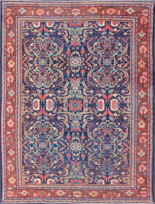 Colorful Antique Persian Sultanabad Rug with Navy Blue Field and Red Border. Antique Persian Sultanabad in Blue background and colorful field. Keivan Woven Arts/rug/ B - 0536, country of origin / type: Iran / Sultanabad, circa 1910 Measures: 9 x 1... - Keivan Woven ArtsB - 0536 - 621Rug