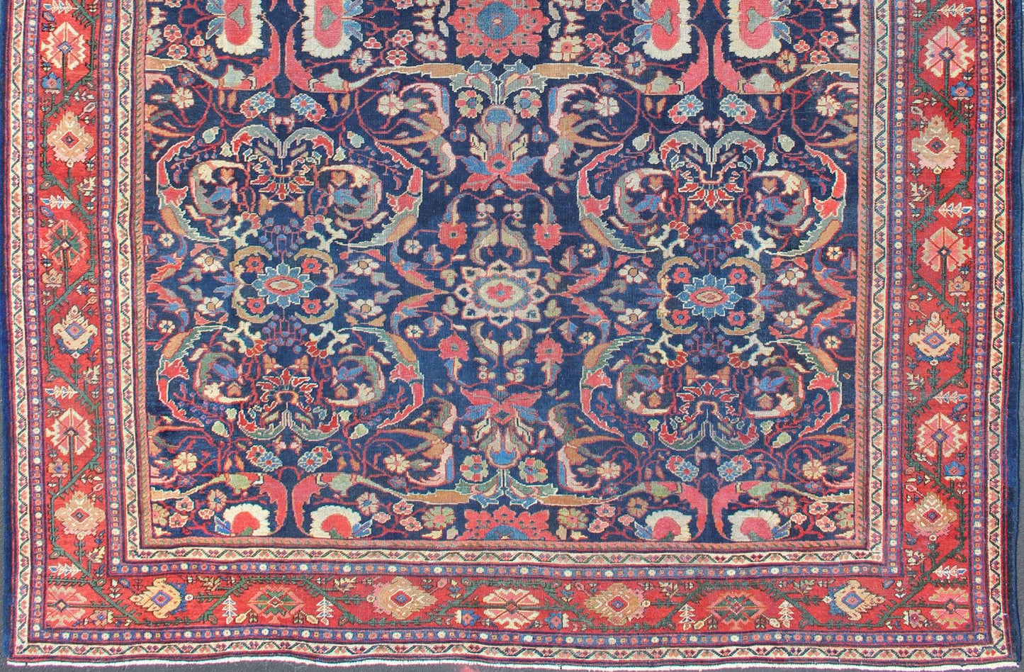 Colorful Antique Persian Sultanabad Rug with Navy Blue Field and Red Border. Antique Persian Sultanabad in Blue background and colorful field. Keivan Woven Arts/rug/ B - 0536, country of origin / type: Iran / Sultanabad, circa 1910 Measures: 9 x 1... - Keivan Woven ArtsB - 0536 - 621Rug