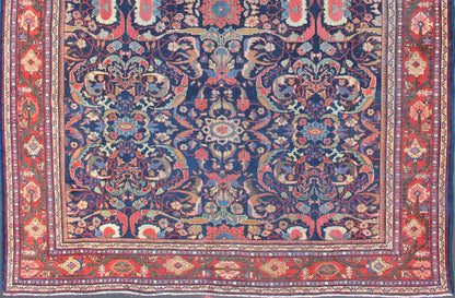 Colorful Antique Persian Sultanabad Rug with Navy Blue Field and Red Border. Antique Persian Sultanabad in Blue background and colorful field. Keivan Woven Arts/rug/ B - 0536, country of origin / type: Iran / Sultanabad, circa 1910 Measures: 9 x 1... - Keivan Woven ArtsB - 0536 - 621Rug