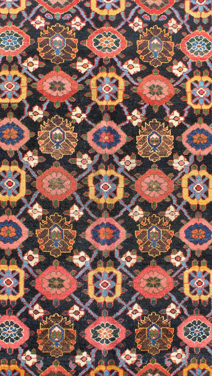 Antique Persian Bakhtiari Rug This antique Persian Bakhtiar rug features an all - over floral pattern in vivid colors of pink, yellow, coral, orange, blue and hints of ivory. The blue border consists of pink and coral flowers with green vines. The... - Keivan Woven ArtsB - 0713 - 2201Rug