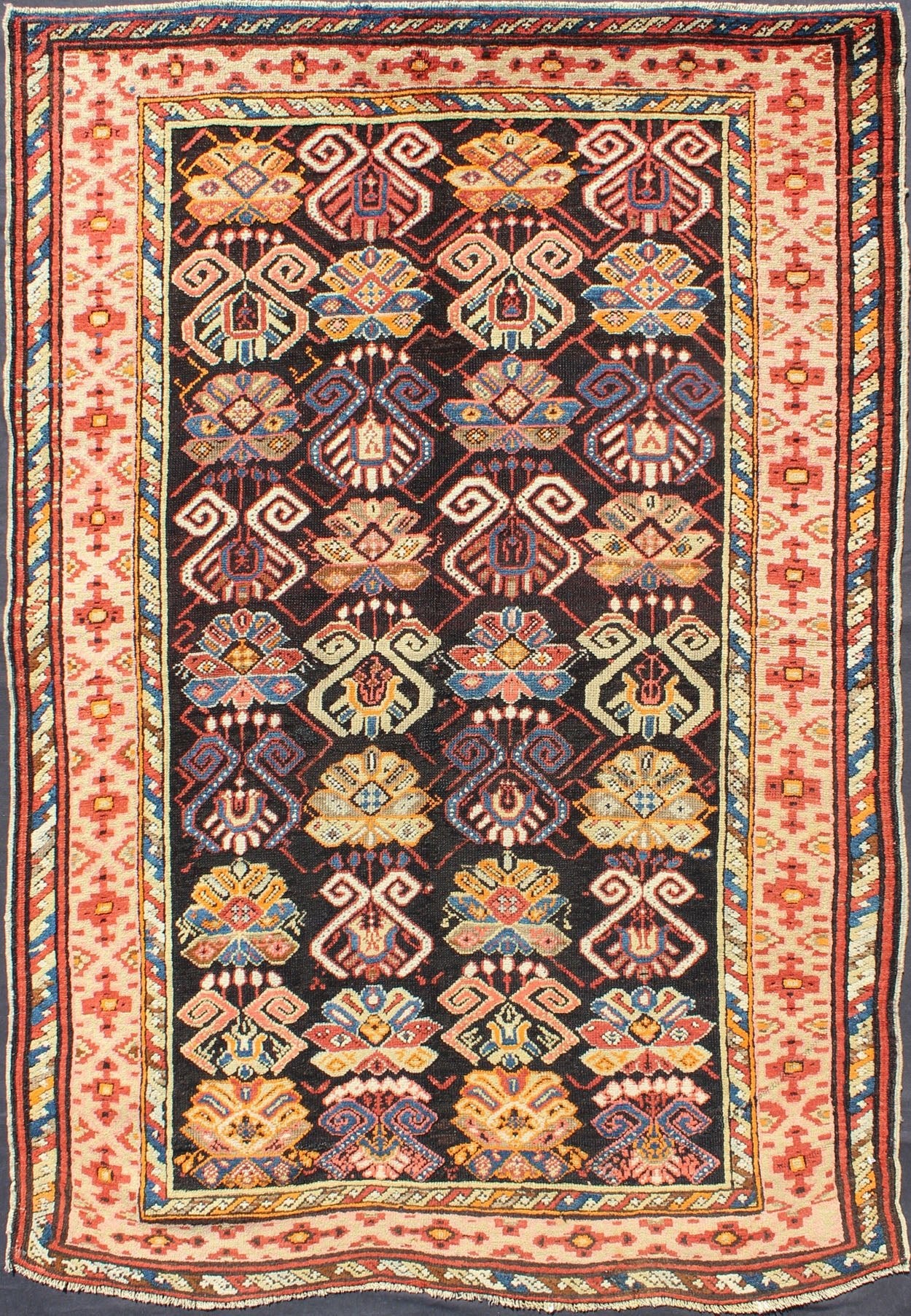 Colorful Antique Caucasian Rug with All - Over Design, rug/B - 1203, antique Caucasian, antique Karabagh This uniquely colorful antique Caucasian carpet bears an alternating pattern of highly stylized geometric motifs within the body of the rug. A m... - Keivan Woven ArtsB - 1203 - 1076Rug