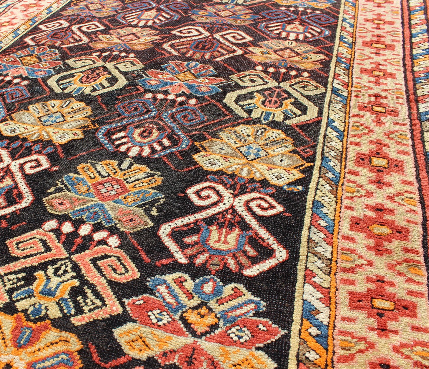 Colorful Antique Caucasian Rug with All - Over Design, rug/B - 1203, antique Caucasian, antique Karabagh This uniquely colorful antique Caucasian carpet bears an alternating pattern of highly stylized geometric motifs within the body of the rug. A m... - Keivan Woven ArtsB - 1203 - 1076Rug