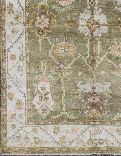 Reproduction Oushak rug with muted tones and neutral color palette and all - over floral design, rug BDH - 712862, country of origin / type: India/ Oushak This New hand knotted Oushak rug features a beautiful design rendered in green tones. Measu... - Keivan Woven ArtsBDH - 712862 - 5950Rug