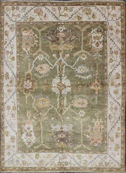 Reproduction Oushak rug with muted tones and neutral color palette and all - over floral design, rug BDH - 712862, country of origin / type: India/ Oushak This New hand knotted Oushak rug features a beautiful design rendered in green tones. Measu... - Keivan Woven ArtsBDH - 712862 - 5950Rug