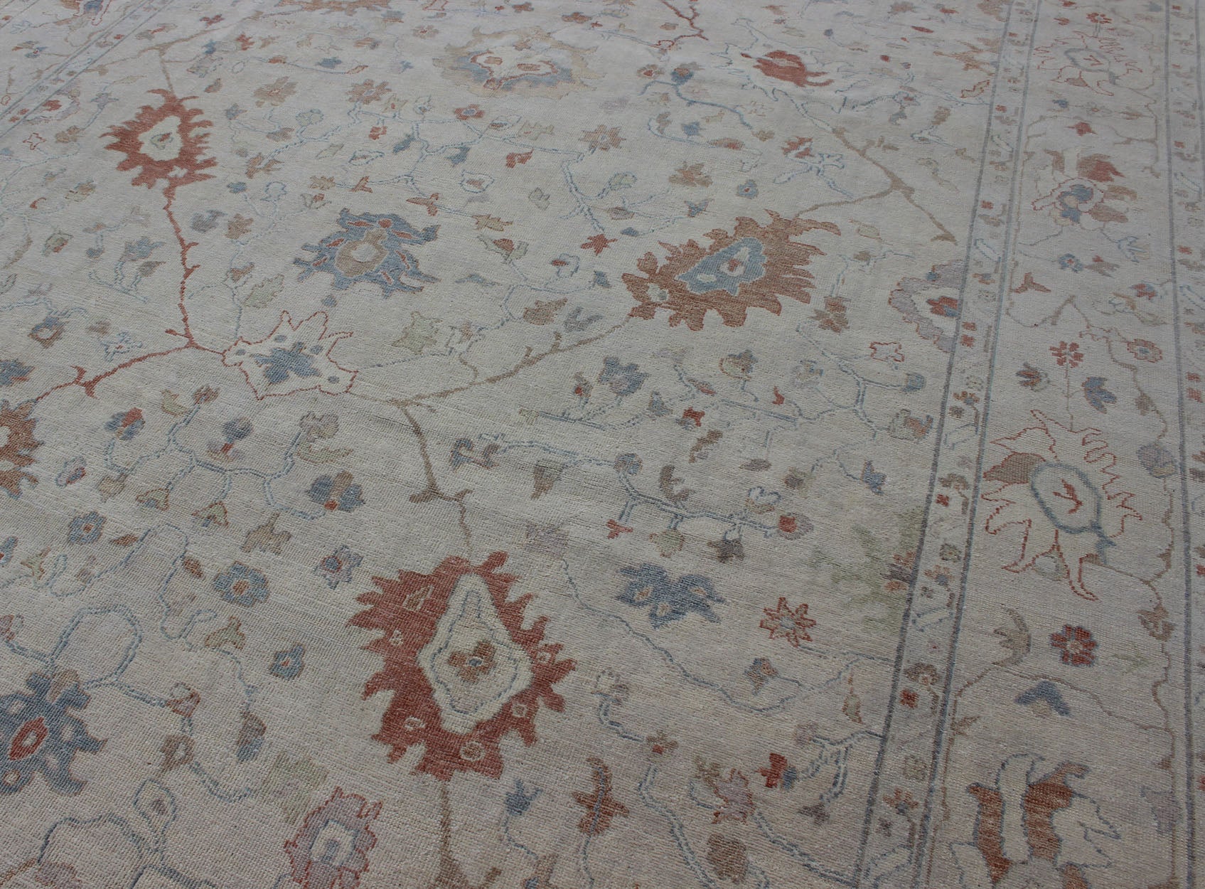Modern Oushak Muted Rug by Keivan Woven Arts in Coral and Light Blue. Measures: 9'2 x 11'9 country of origin: India; Type: Oushak; Design: All - Over, Floral, Oushak Floral; Keivan Woven Arts: rug BDH - 742079; Oushak rug with blue and coral, ne... - Keivan Woven ArtsBDH - 742079 - 10866Rug
