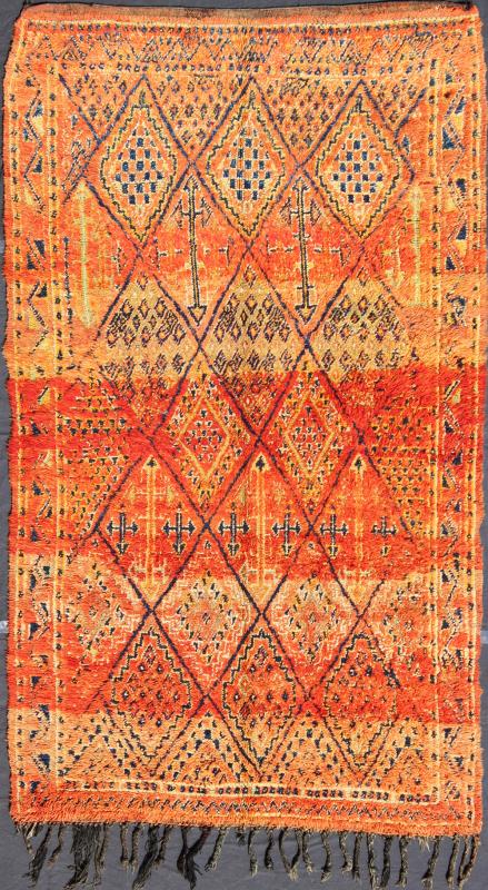 Vintage Moroccan Beni Mklid Rug in Oranges and Creams with Deep Navy Blue Measures: 5'11'' x 10'4''. Woven on a gorgeous luscious black wool base, this original vintage carpet features finely structured diamonds flanked by skillfully woven sy... - Keivan Woven ArtsBDS - 136614 - 7271Rug