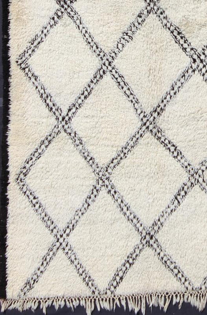 Large White Background Vintage Beni Ourain Moroccan Rug with Charcoal Diamonds Measures: 6'6'' x 11'0''. This graphic handwoven, tribal Beni Ourain rug features an all - over design of large, interconnected diamond shapes; three of which stand ... - Keivan Woven ArtsBDS - 136630 - 7291Rug