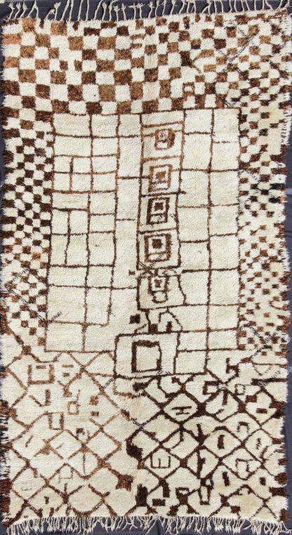 Large Vintage Moroccan Beni Ourain Rug in Browns, Mocha and Cream Measures: 7'5'' x 13'7''. This fabulously complex and interesting carpet features principally lozenge - based designs with a lattice flanked by checkered and diamond shapes fille... - Keivan Woven ArtsBDS - 136632 - 7295Rug