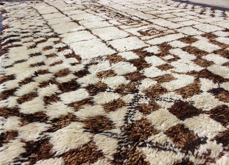 Large Vintage Moroccan Beni Ourain Rug in Browns, Mocha and Cream Measures: 7'5'' x 13'7''. This fabulously complex and interesting carpet features principally lozenge - based designs with a lattice flanked by checkered and diamond shapes fille... - Keivan Woven ArtsBDS - 136632 - 7295Rug