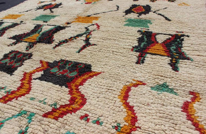 Vintage Moroccan Azilal Rug with Tribal design in bright Colors. This Moroccan carpet offers comfort and warmth with a neutral field and vivid color palette. Keivan Woven Arts Rug/BDS - 136634. Set on an off white background, this rug features s... - Keivan Woven ArtsBDS - 136634 - 7299Rug