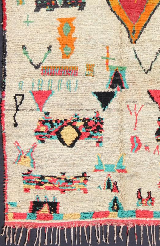 Vintage Moroccan Azilal Rug with Tribal design in bright Colors. This Moroccan carpet offers comfort and warmth with a neutral field and vivid color palette. Keivan Woven Arts Rug/BDS - 136634. Set on an off white background, this rug features s... - Keivan Woven ArtsBDS - 136634 - 7299Rug