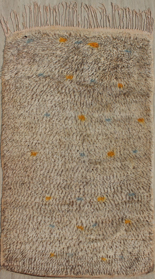 Vintage Moroccan Rug On A Taupe Field With Pops of Blue and Yellow Vintage Moroccan Rug On A Taupe Field With Pops of Blue and Yellow. rug BDS - 20124, Keivan Woven Arts / country of origin / type: Morocco / Tribal, circa 1940. This uniq... - Keivan Woven ArtsBDS - 20124 - 9571Rug