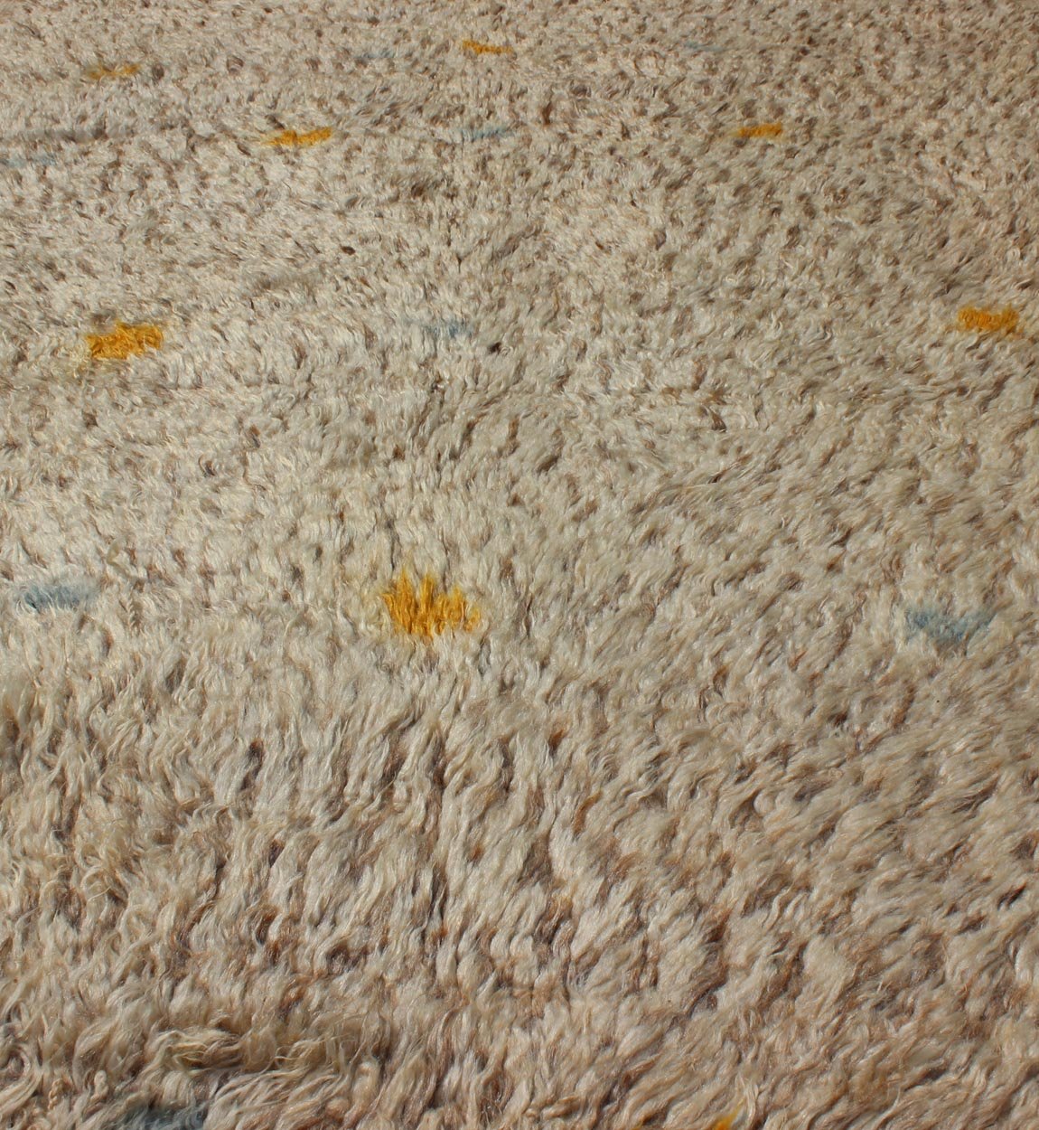 Vintage Moroccan Rug On A Taupe Field With Pops of Blue and Yellow Vintage Moroccan Rug On A Taupe Field With Pops of Blue and Yellow. rug BDS - 20124, Keivan Woven Arts / country of origin / type: Morocco / Tribal, circa 1940. This uniq... - Keivan Woven ArtsBDS - 20124 - 9571Rug