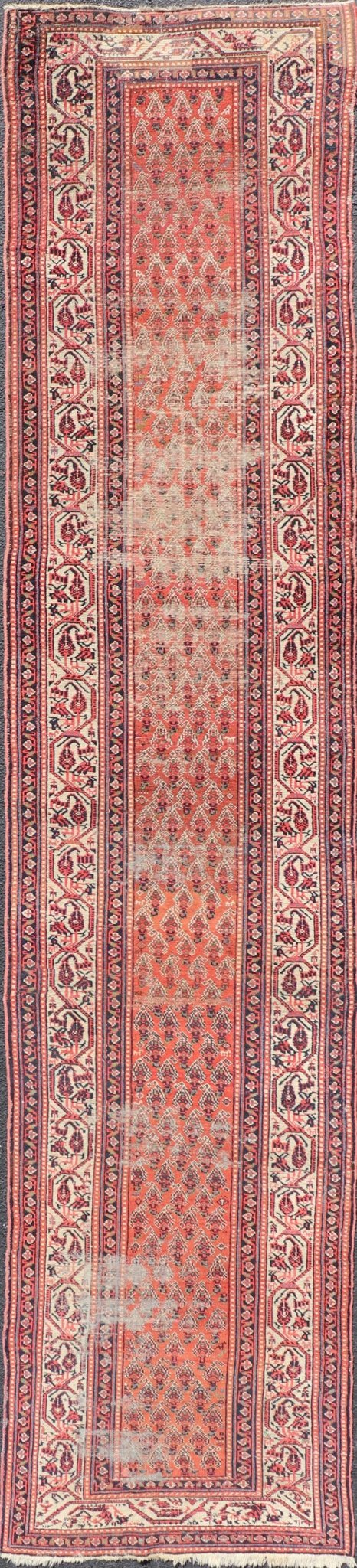 Distressed Antique Persian Malayer Runner with Field of Paisleys Design in Red Measures 3'2 x 15'2 This century old Persian Malayer defines the craftsmanship of this era. The multi - tier border features inner and outer guards decorat... - Keivan Woven ArtsBW - 1 - 20860Rug