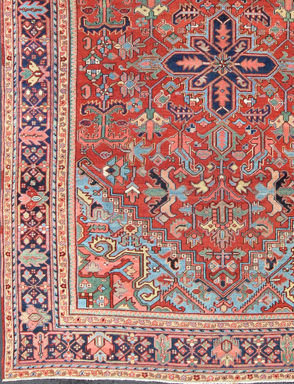 Antique Heriz - Serapi Rug with Small Central Medallion and Geometric Design Made in the early 20th Century in Iran, this charming antique Heriz features an open design and an array of cheerful colors. Surrounding its small central medallion, this... - Keivan Woven ArtsC - 0105 - 1726Rug