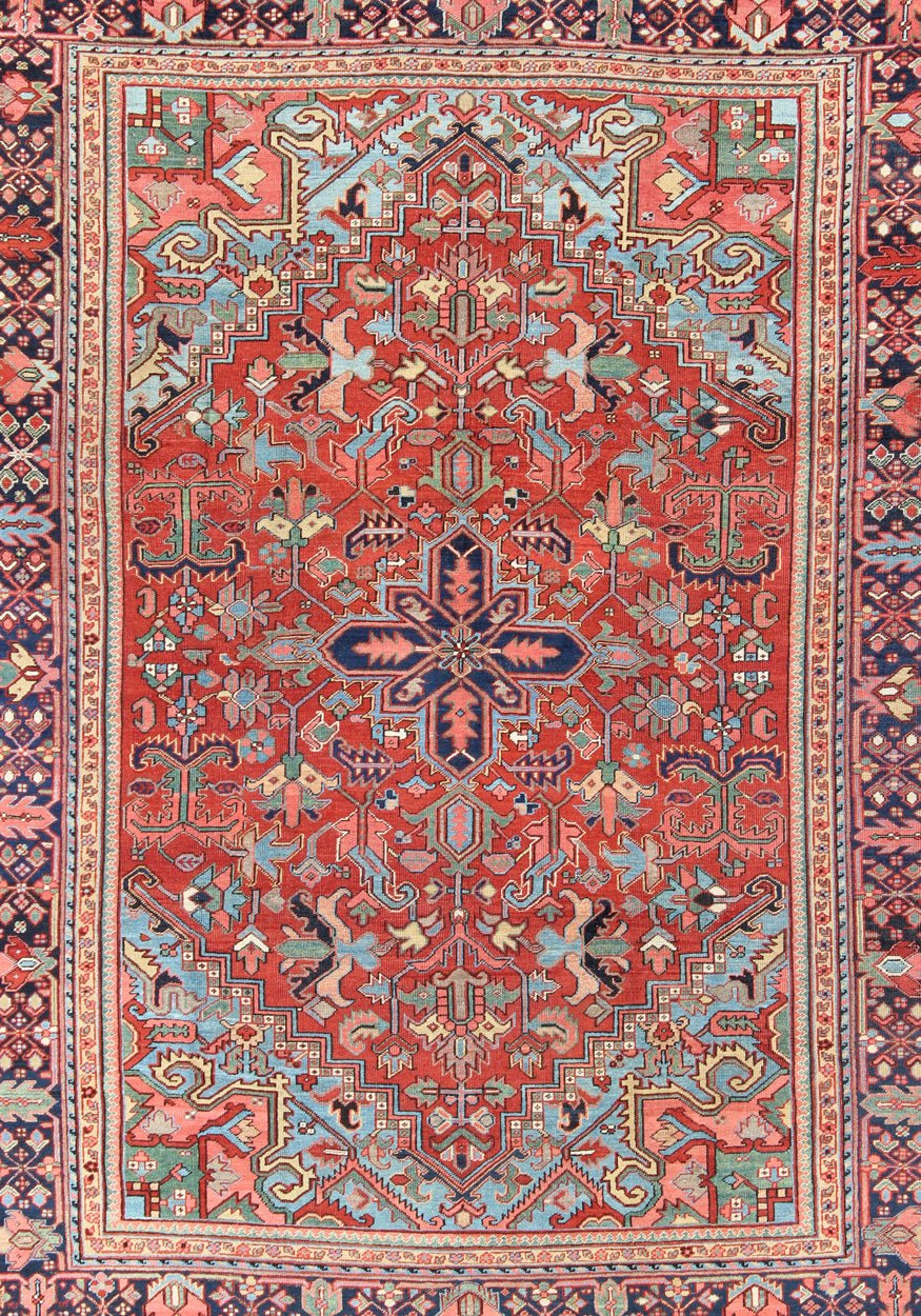 Antique Heriz - Serapi Rug with Small Central Medallion and Geometric Design Made in the early 20th Century in Iran, this charming antique Heriz features an open design and an array of cheerful colors. Surrounding its small central medallion, this... - Keivan Woven ArtsC - 0105 - 1726Rug