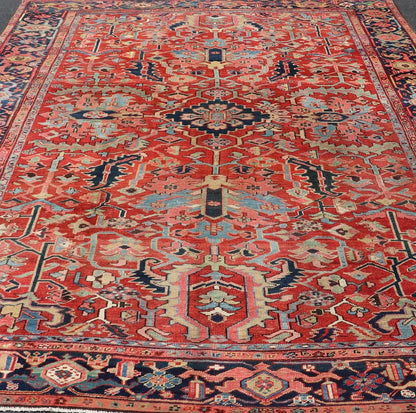 Antique Persian All Over Large Serapi Rug With Rust Red Background and Blue Border and large scale geometric Flowers. Keivan Woven Arts / Rug / C - 0301, country of origin / type: Iran /Serapi, circa 1900. Measures: 10' x 13'10. This Anti... - Keivan Woven ArtsC - 0301 - 451Rug