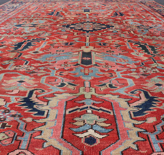 Antique Persian All Over Large Serapi Rug With Rust Red Background and Blue Border and large scale geometric Flowers. Keivan Woven Arts / Rug / C - 0301, country of origin / type: Iran /Serapi, circa 1900. Measures: 10' x 13'10. This Anti... - Keivan Woven ArtsC - 0301 - 451Rug