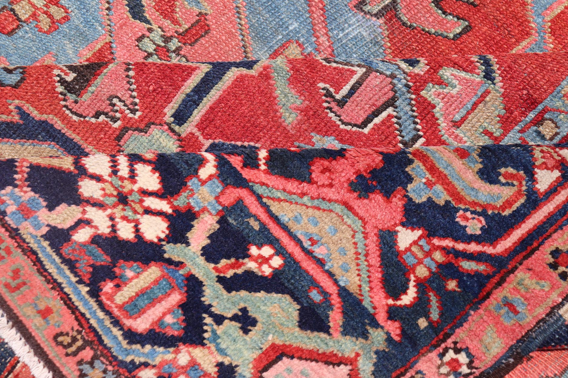 Antique Persian All Over Large Serapi Rug With Rust Red Background and Blue Border and large scale geometric Flowers. Keivan Woven Arts / Rug / C - 0301, country of origin / type: Iran /Serapi, circa 1900. Measures: 10' x 13'10. This Anti... - Keivan Woven ArtsC - 0301 - 451Rug