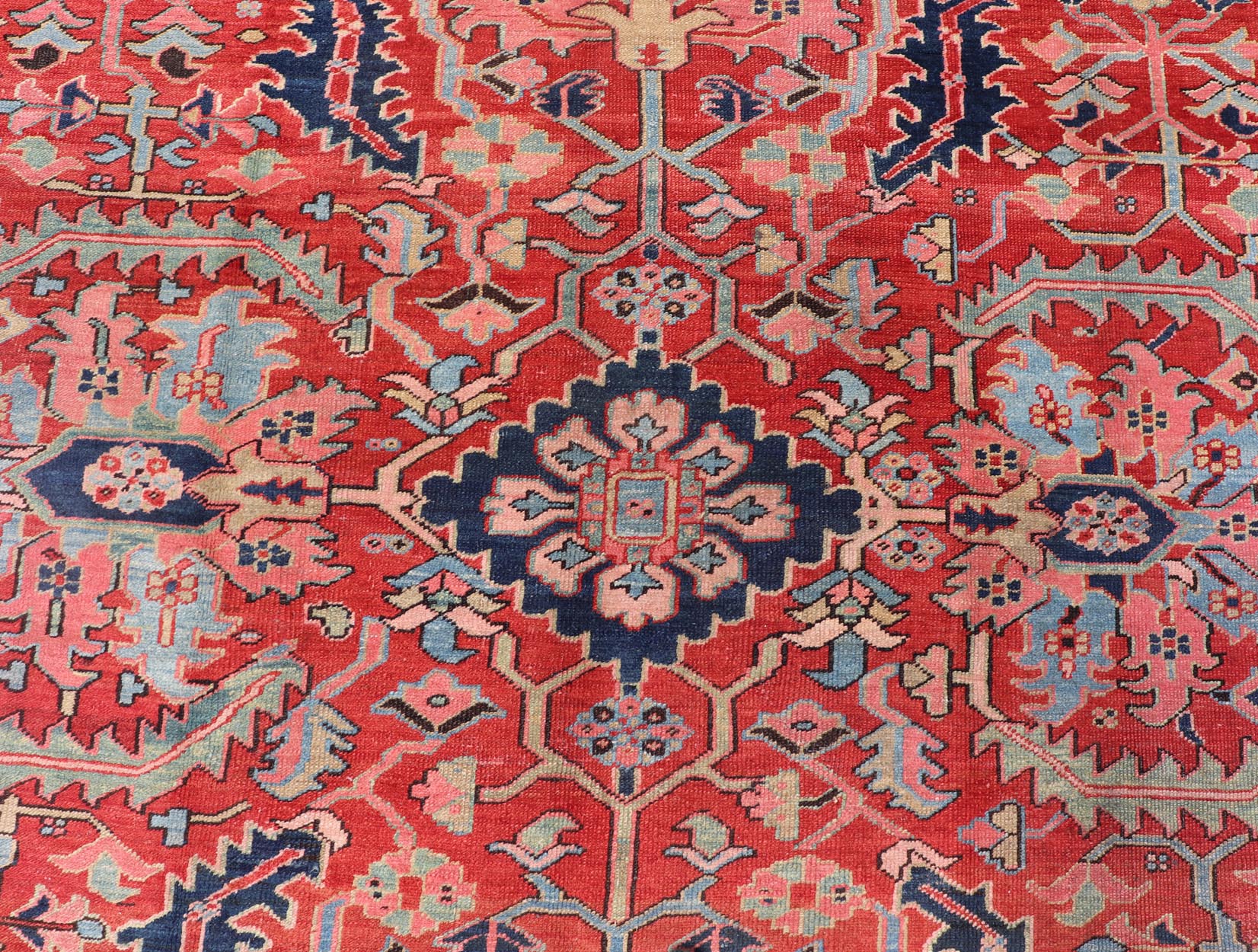 Antique Persian All Over Large Serapi Rug With Rust Red Background and Blue Border and large scale geometric Flowers. Keivan Woven Arts / Rug / C - 0301, country of origin / type: Iran /Serapi, circa 1900. Measures: 10' x 13'10. This Anti... - Keivan Woven ArtsC - 0301 - 451Rug