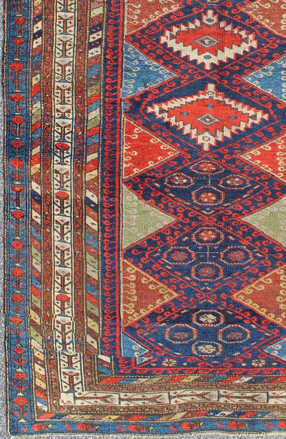 Antique Kurdish Kazak with Tribal and Geometric Motifs KWARUG C - 0525 Regardless of where you place this remarkable carpet, its stunning array of colors and exquisite geometric design will transport you to a place of rare, exotic beauty. Fashione... - Keivan Woven ArtsC - 0525 - 223