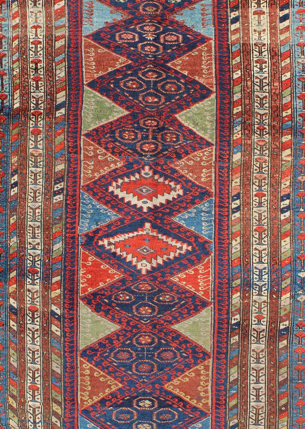 Antique Kurdish Kazak with Tribal and Geometric Motifs KWARUG C - 0525 Regardless of where you place this remarkable carpet, its stunning array of colors and exquisite geometric design will transport you to a place of rare, exotic beauty. Fashione... - Keivan Woven ArtsC - 0525 - 223